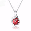 Image of Sterling Silver Red Stone Dolphin Pendant Necklaces