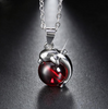 Image of Sterling Silver Red Stone Dolphin Pendant Necklaces